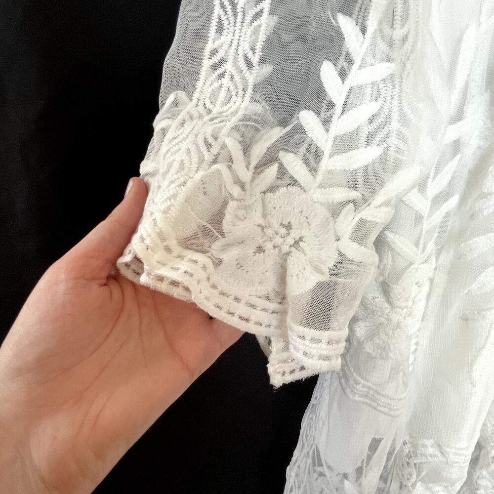 Elegant White Embroidered Maxi Dress with V-Neck - Picture 6 of 11